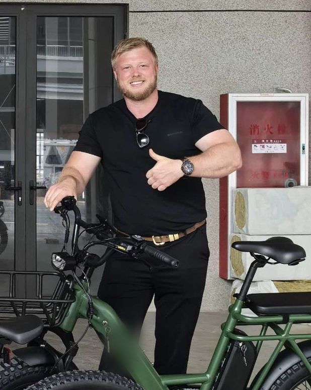 Joe Lindsay with an own-brand cargo e-bike in China